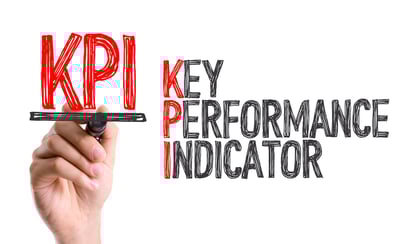Hand with marker writing KPI